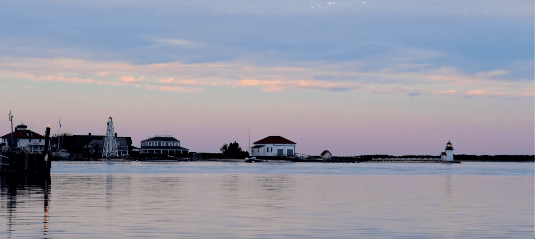 A House With A Lake On The Front In Color