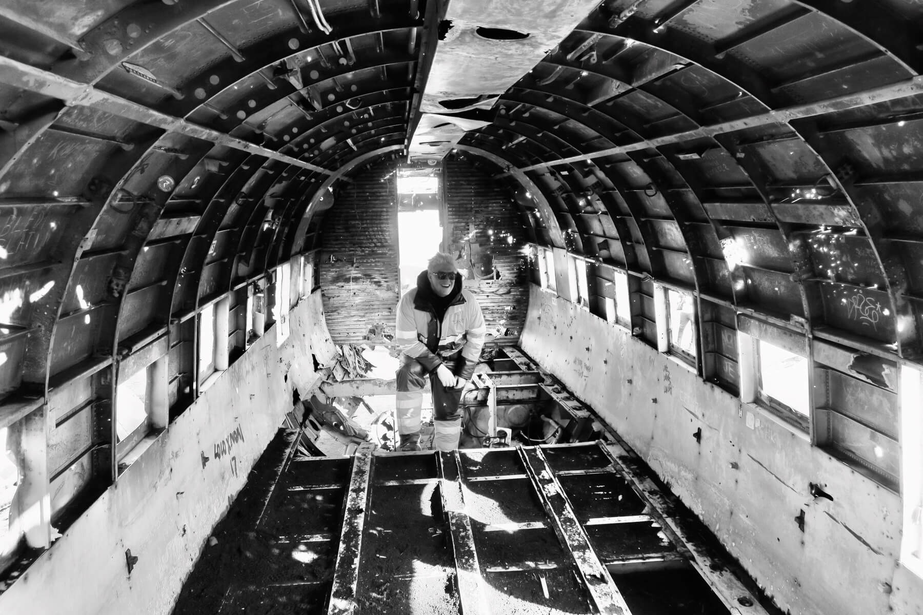 A black and white photo of an old airplane.